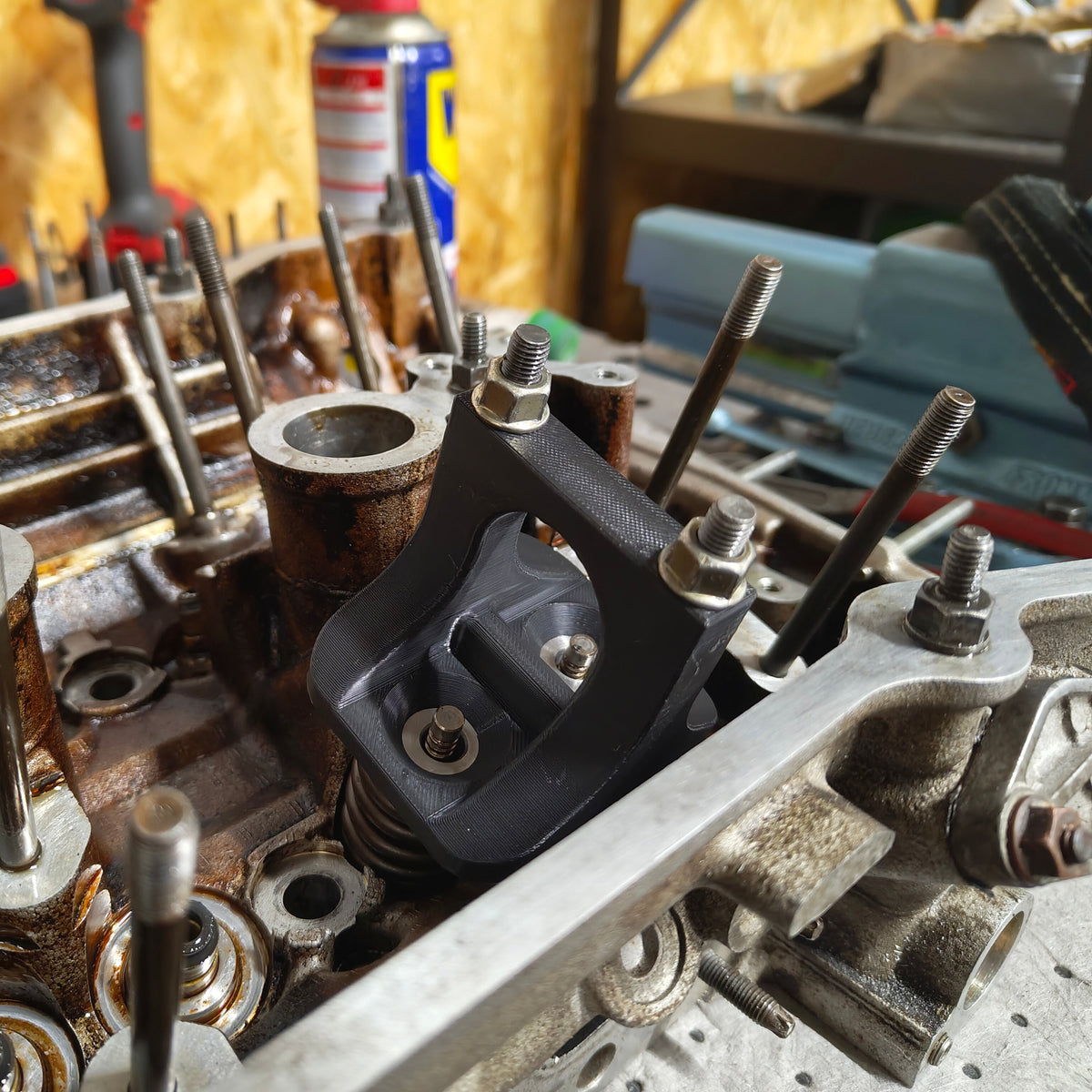 M5X valve spring compressor on a cylinder head