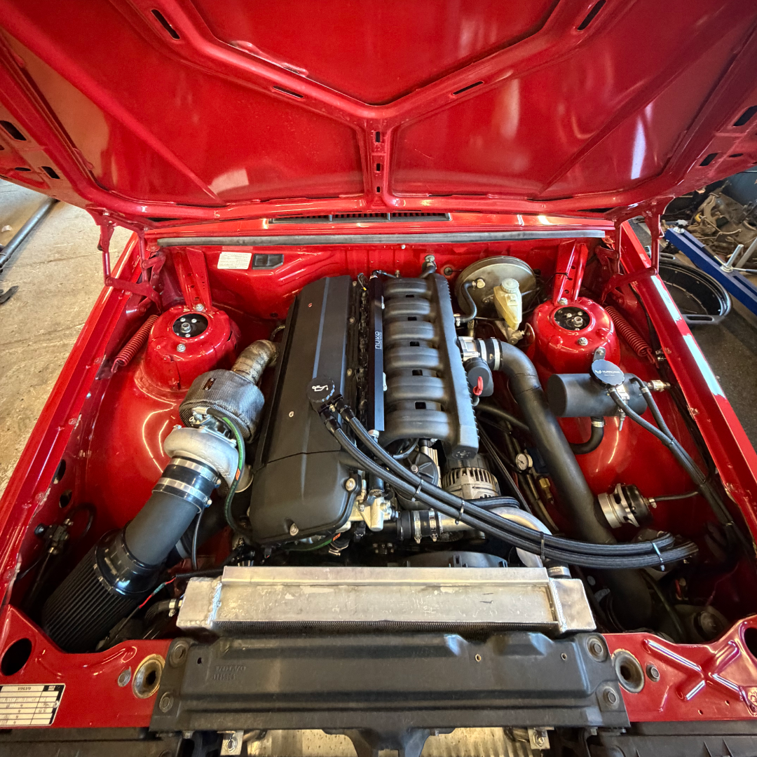 BMW engine bay with the vented oil cap installed