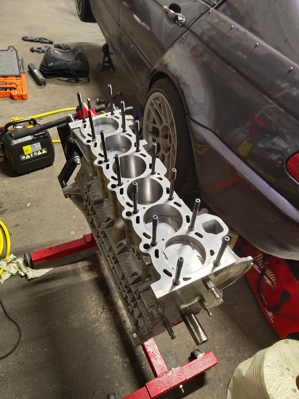 M54 block with head studs installed in the thread inserts